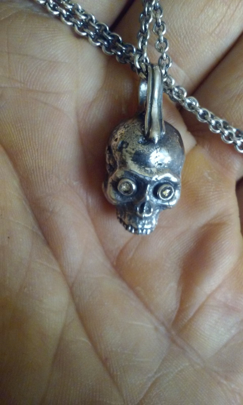 925 silver gothic skull pendant with diamond eyes.