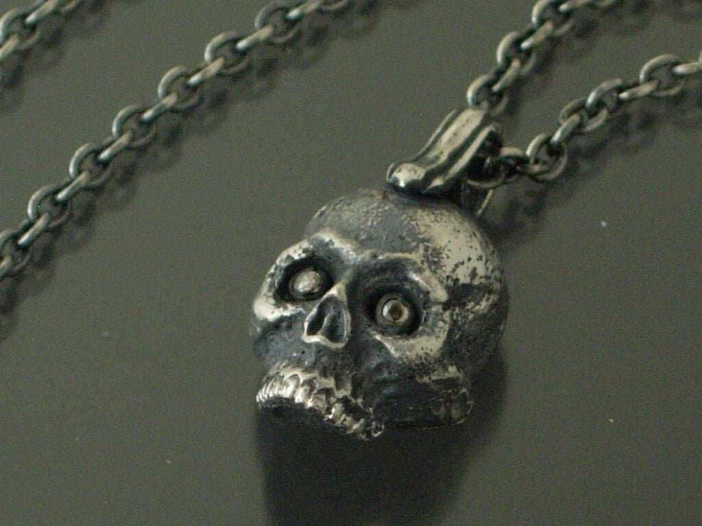 925 silver gothic skull pendant with diamond eyes.