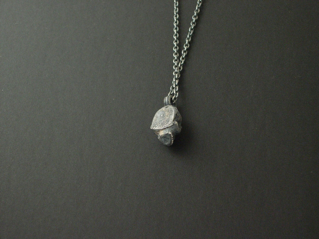 925 silver gothic skull pendant with diamond eyes.