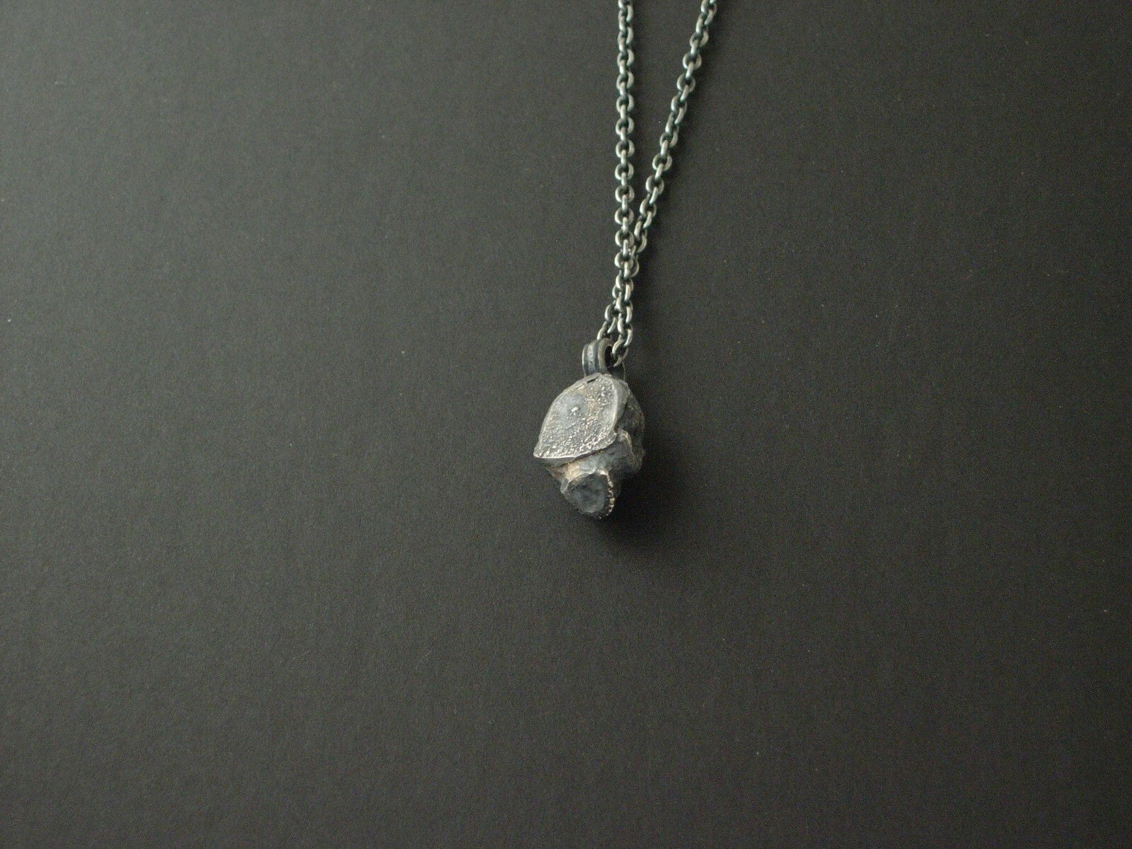 925 silver gothic skull pendant with diamond eyes.