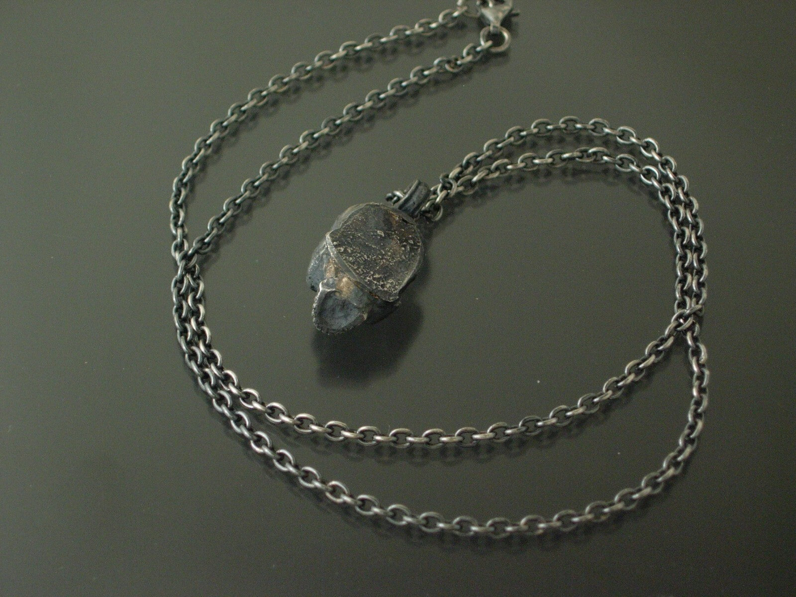 925 silver gothic skull pendant with diamond eyes.