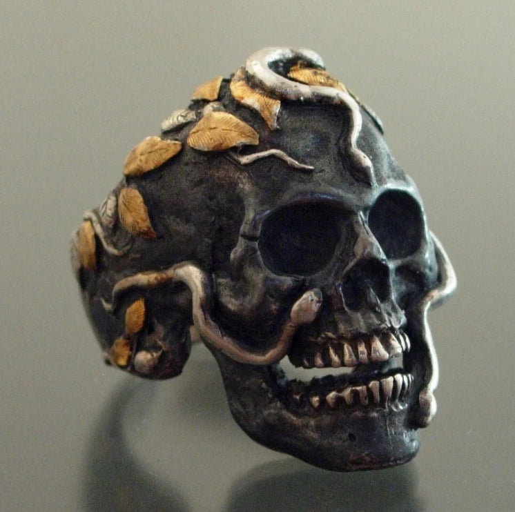Silver and pure gold snake skull ring