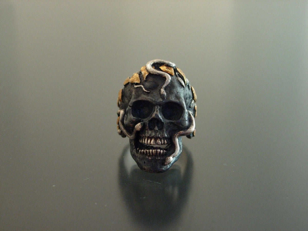 Silver and pure gold snake skull ring