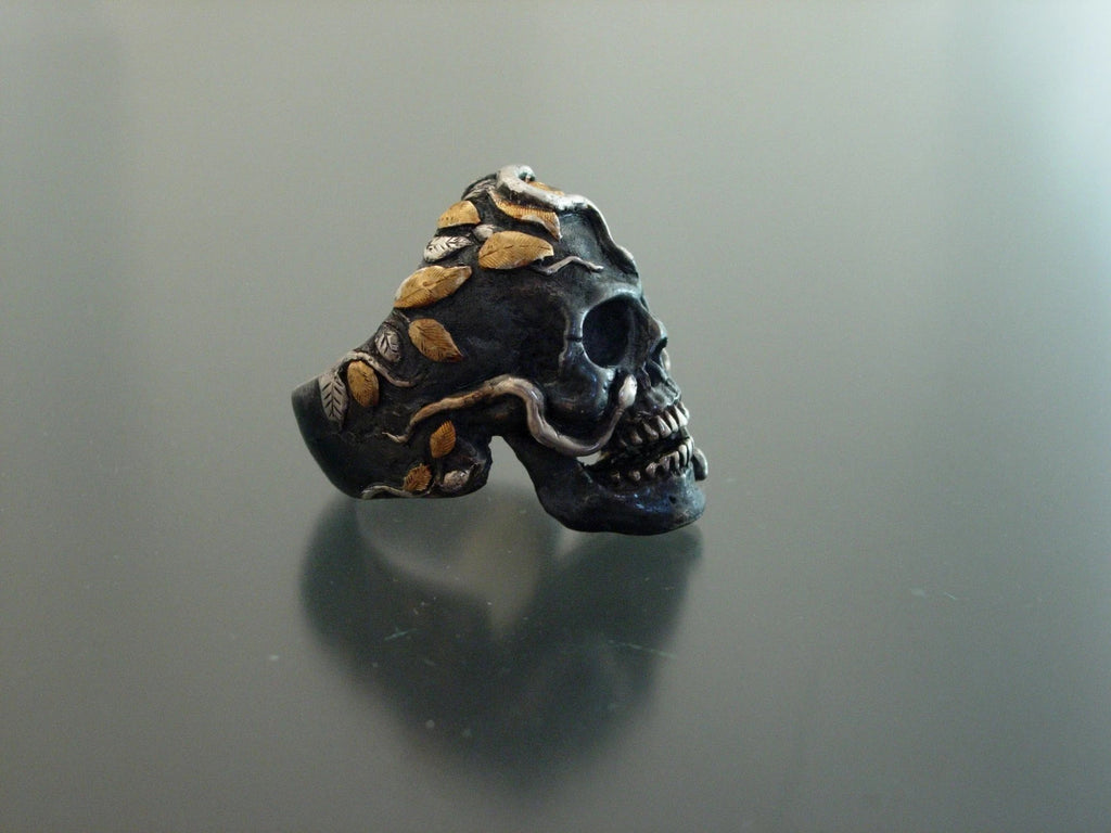 Silver and pure gold snake skull ring