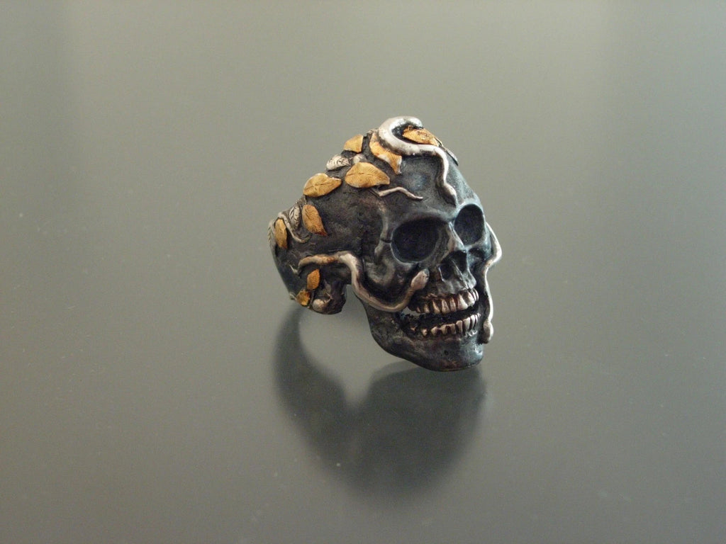 Silver and pure gold snake skull ring