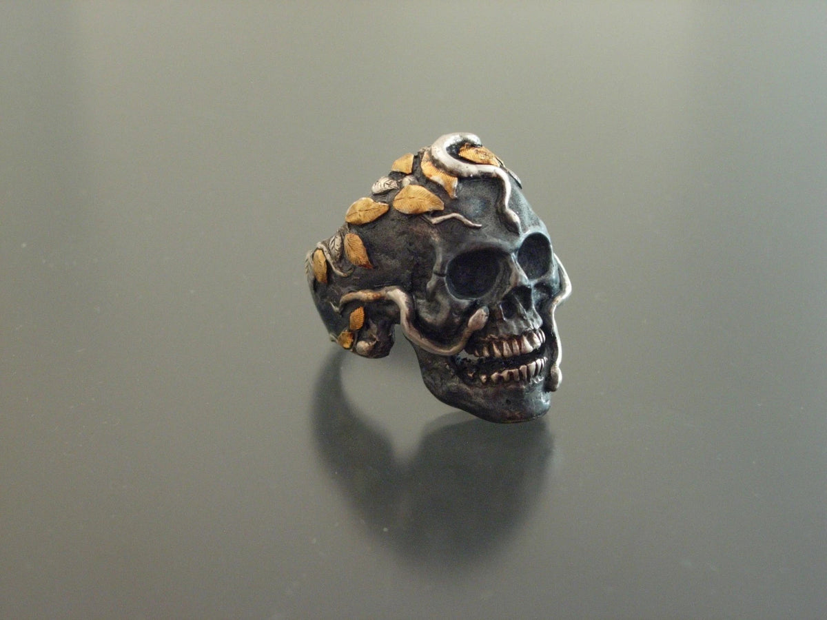 Silver and pure gold snake skull ring