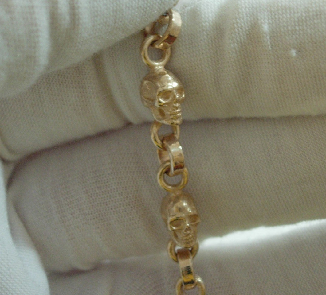 10k GOLD SKULL BRACELET  SOLID 10K GOLD 9 INCH 30 GRAMS .