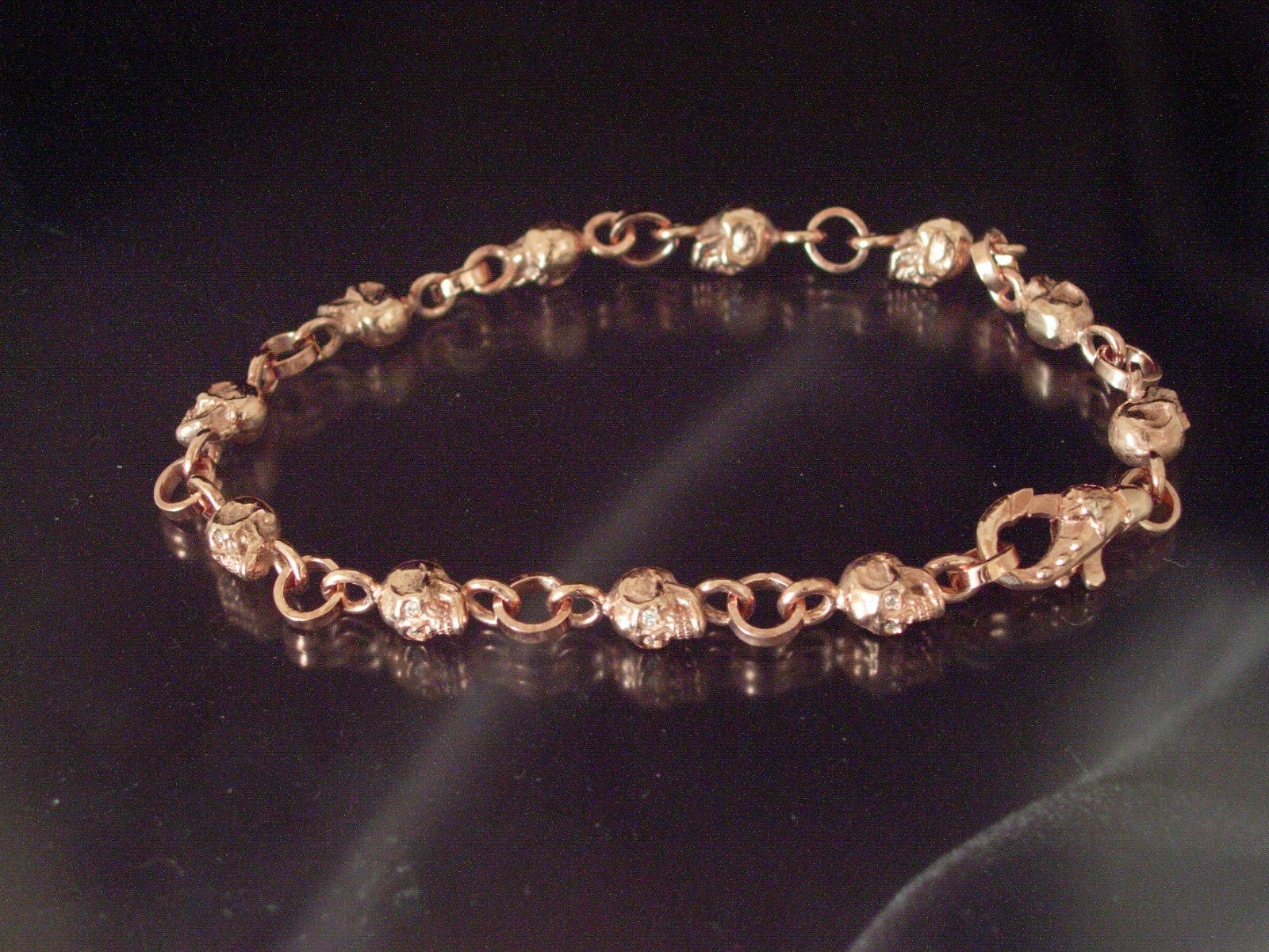 10k GOLD SKULL BRACELET  SOLID 10K GOLD 9 INCH 30 GRAMS .