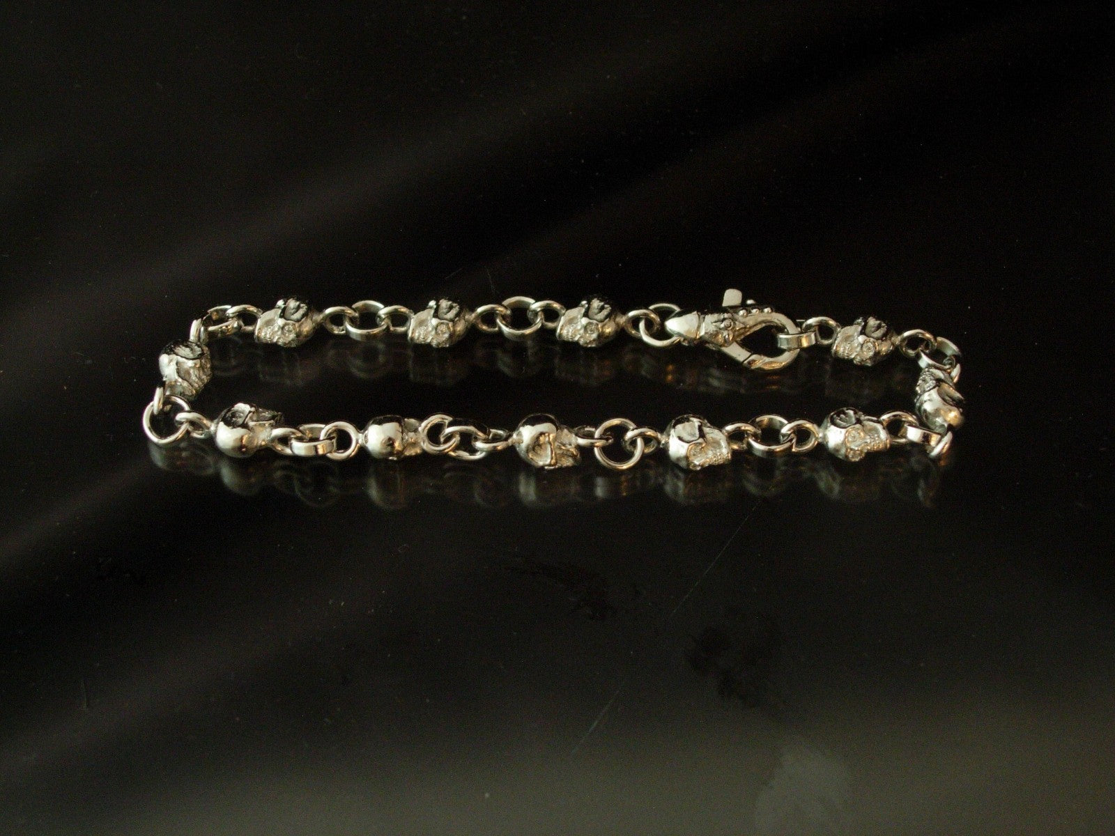 10k WHITE GOLD SKULL BRACELET  SOLID 10K GOLD 9 INCH 30 GRAMS .