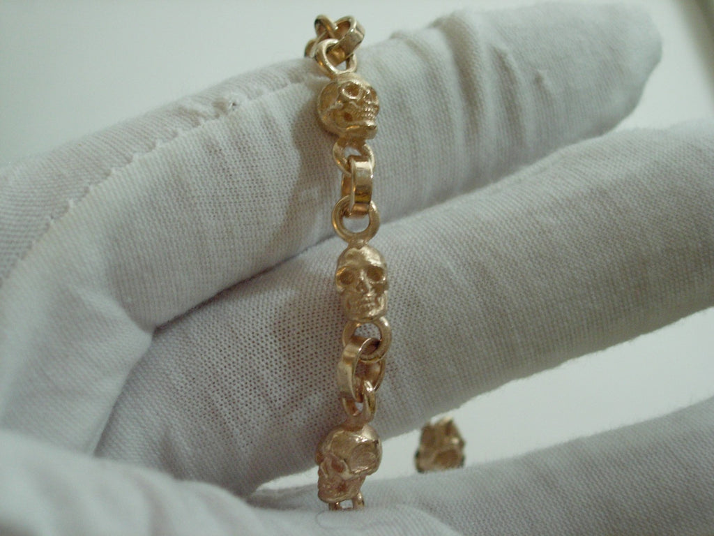 10k GOLD SKULL BRACELET  SOLID 10K GOLD 9 INCH 30 GRAMS .