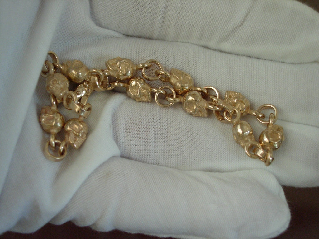 10k GOLD SKULL BRACELET  SOLID 10K GOLD 9 INCH 30 GRAMS .