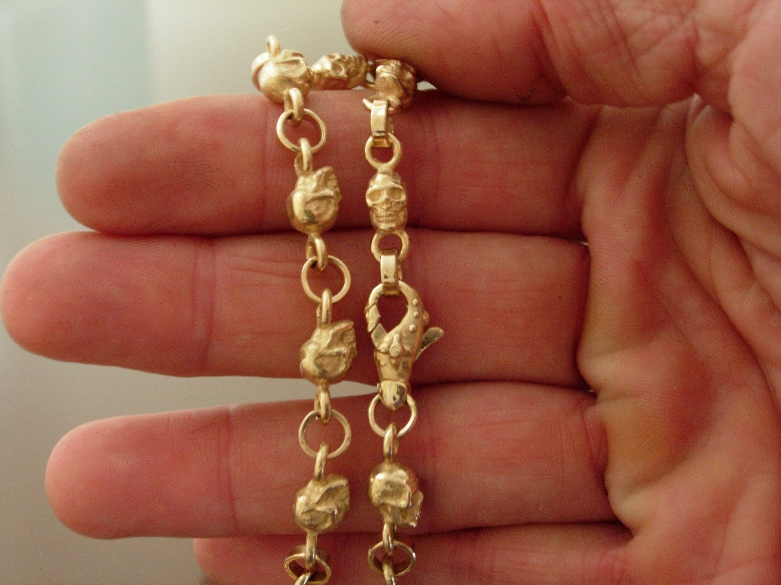 10k GOLD SKULL BRACELET  SOLID 10K GOLD 9 INCH 30 GRAMS .