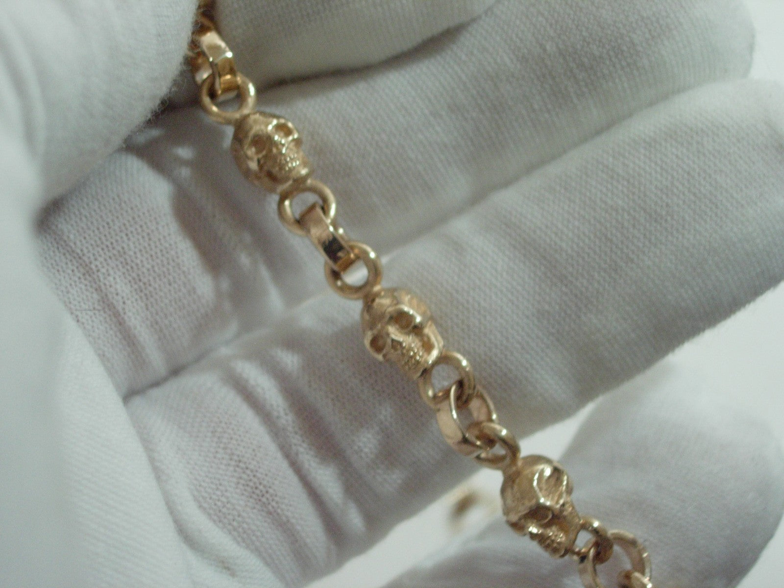 10k GOLD SKULL BRACELET  SOLID 10K GOLD 9 INCH 30 GRAMS .
